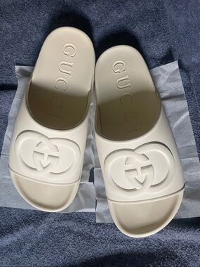 Gucci Cream Interlocking GG Logo Slide Sandals